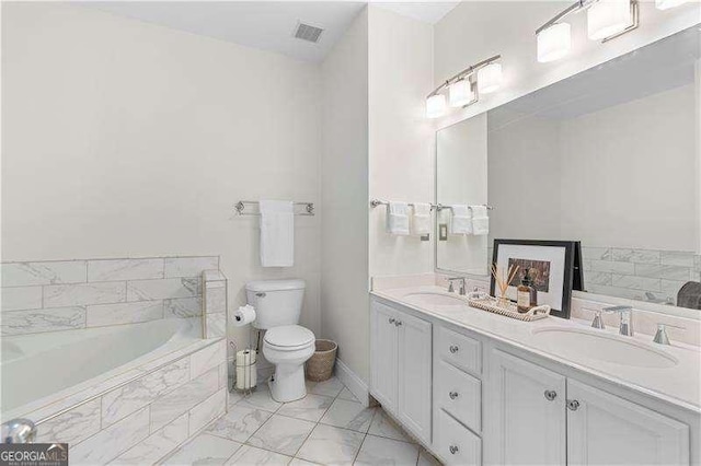 full bathroom featuring double vanity, visible vents, a garden tub, and a sink