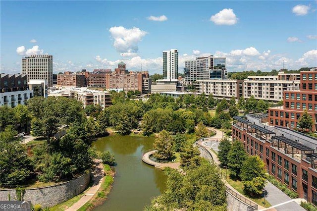 birds eye view of property with a view of city