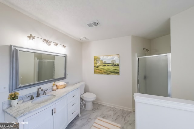 bathroom featuring vanity, visible vents, a shower stall, toilet, and marble finish floor