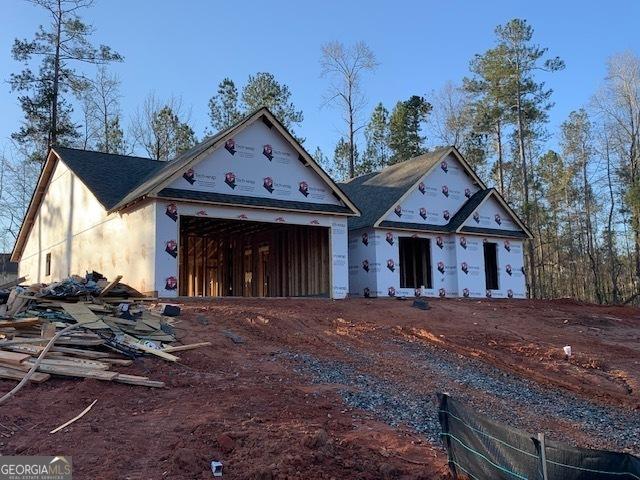 property under construction with an attached garage