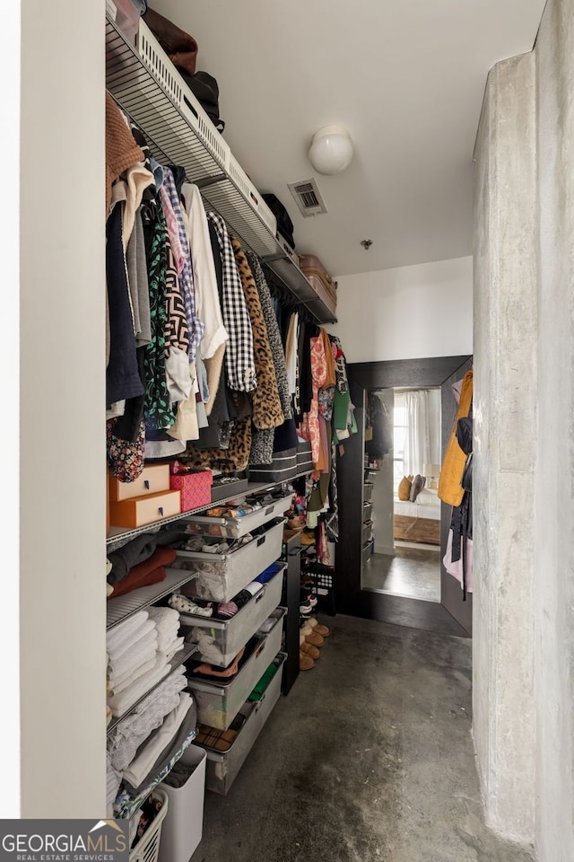 walk in closet featuring visible vents