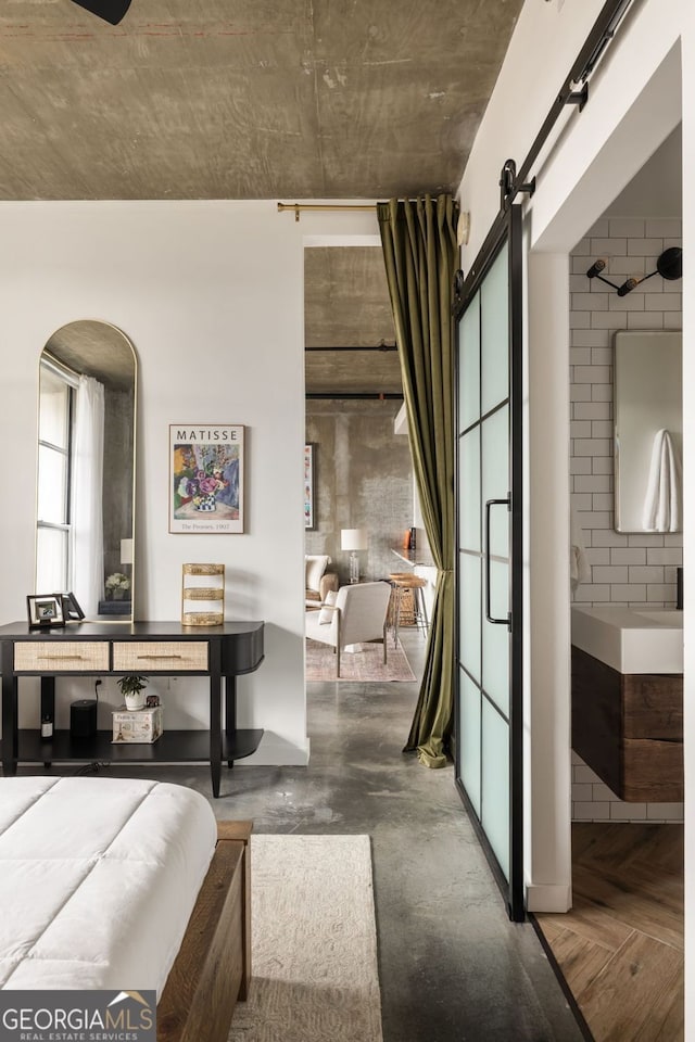 bedroom with a barn door