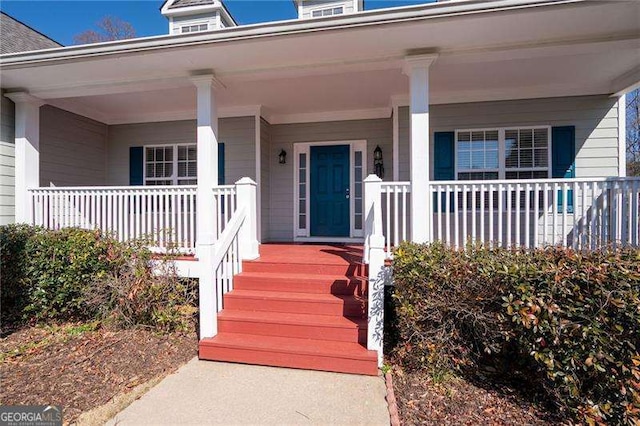 entrance to property with covered porch