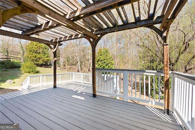 wooden terrace with a pergola