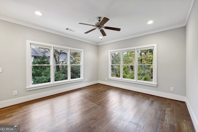 unfurnished room with recessed lighting, visible vents, baseboards, and wood finished floors