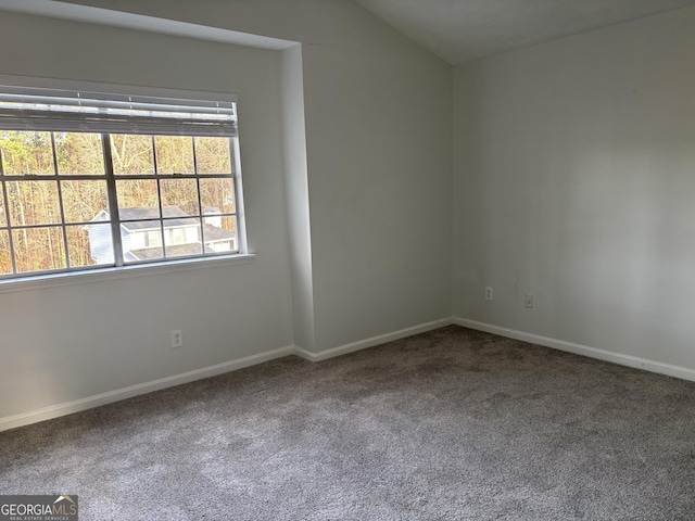 3789 Conley Downs Ln, Decatur, GA 30034 - unfurnished room featuring baseboards, carpet, and vaulted ceiling