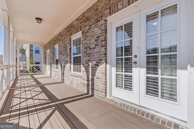 wooden deck with french doors