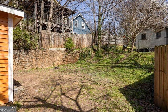 view of yard with fence