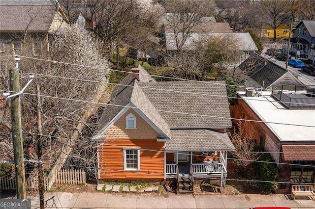 view of front of house featuring fence