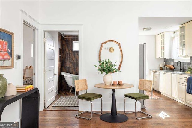 dining room with hardwood / wood-style floors