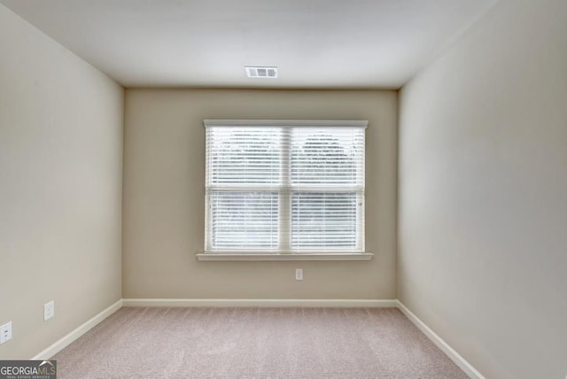 3082 Cedar Glade Ln NE, Buford, GA 30519 - carpeted spare room featuring baseboards
