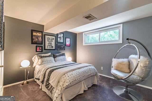 bedroom with carpet and baseboards