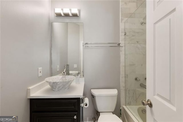 full bathroom featuring shower / bathtub combination, toilet, and vanity