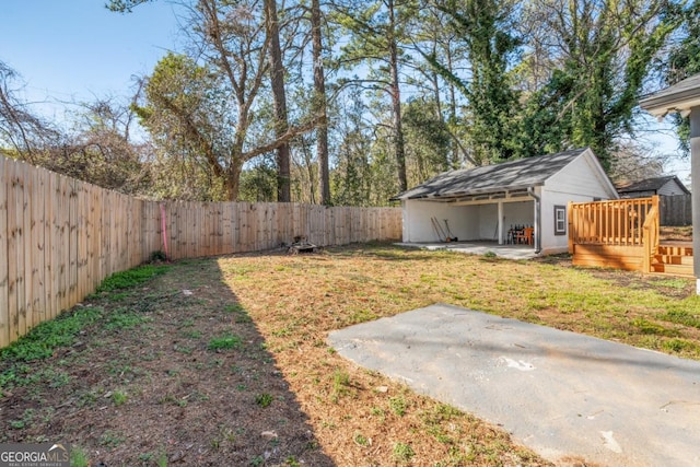 view of yard with a patio and a fenced backyard