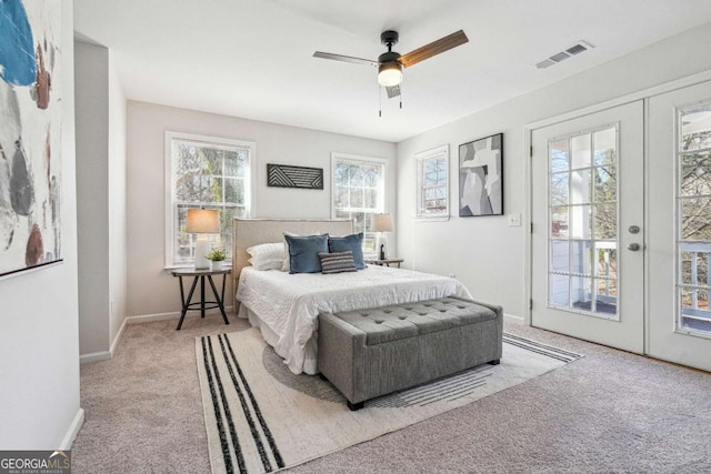 bedroom with access to exterior, visible vents, baseboards, carpet flooring, and french doors