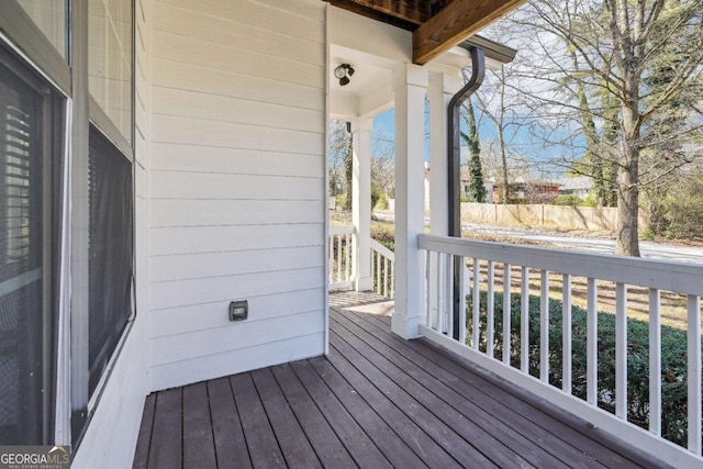 wooden deck featuring a porch