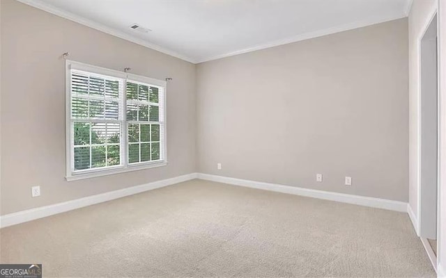 unfurnished room featuring light carpet, baseboards, and ornamental molding