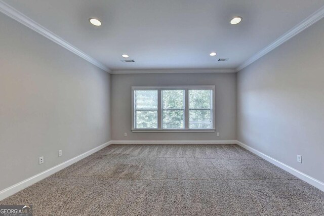 carpeted empty room with recessed lighting, visible vents, baseboards, and ornamental molding