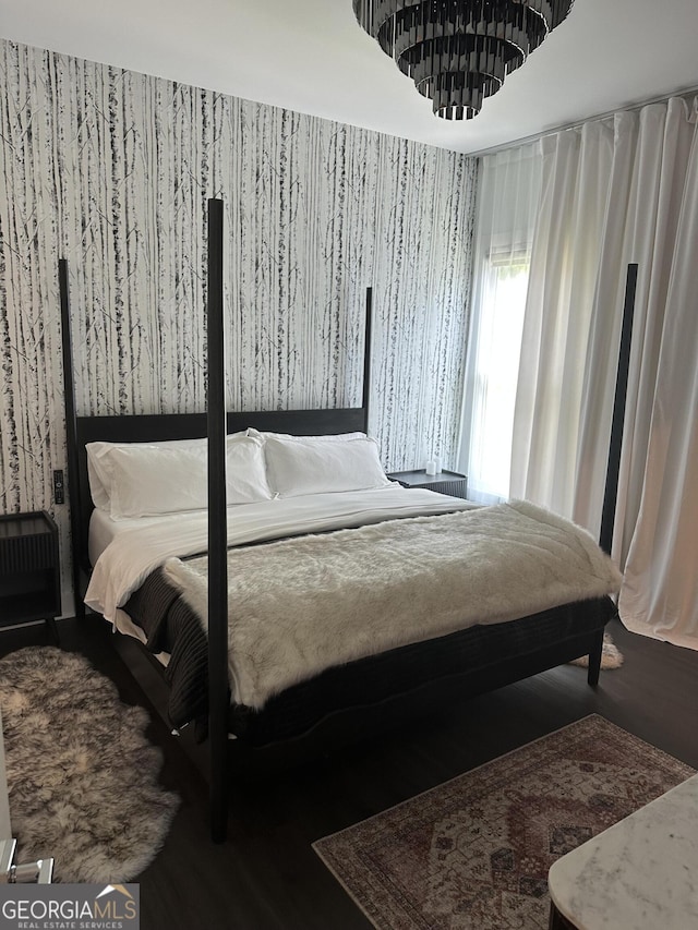 bedroom featuring wallpapered walls