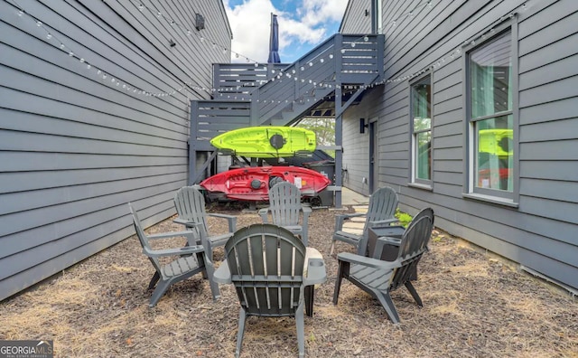 view of patio featuring a fire pit and a pergola