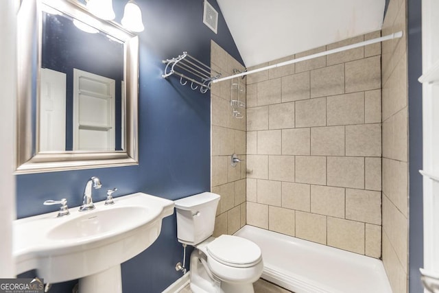 full bathroom featuring a sink, visible vents, toilet, and a stall shower