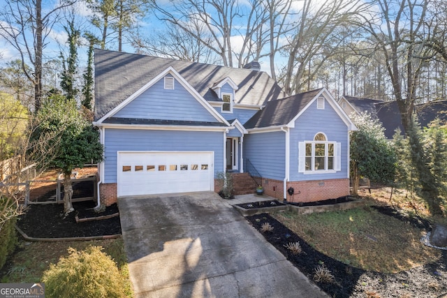 view of front of home with concrete driveway, an attached garage, brick siding, and a chimney