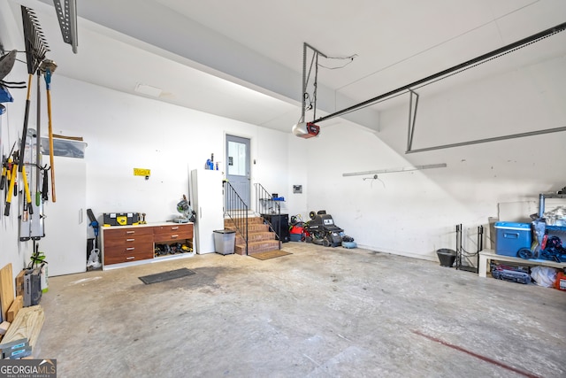 garage featuring a garage door opener