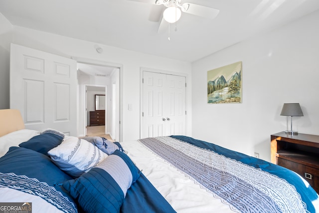 bedroom featuring a closet and a ceiling fan