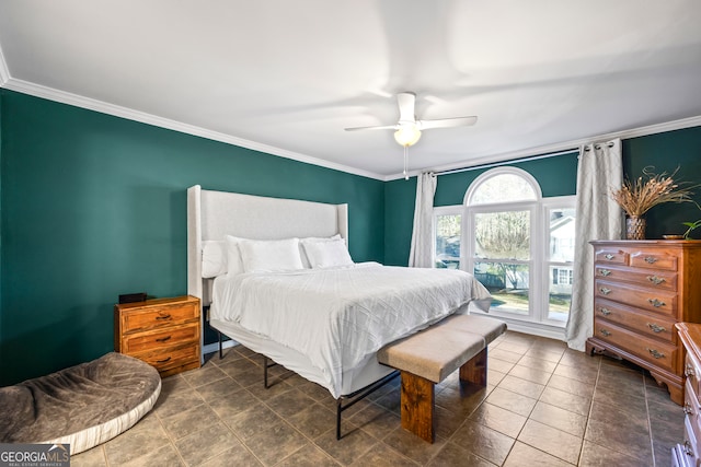 bedroom featuring ceiling fan and ornamental molding