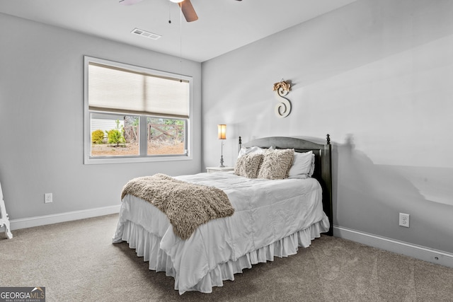 bedroom with visible vents, carpet flooring, a ceiling fan, and baseboards