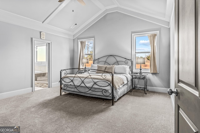 carpeted bedroom featuring visible vents, multiple windows, baseboards, and vaulted ceiling