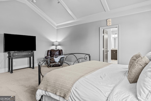 carpeted bedroom featuring baseboards, ensuite bath, and vaulted ceiling with beams