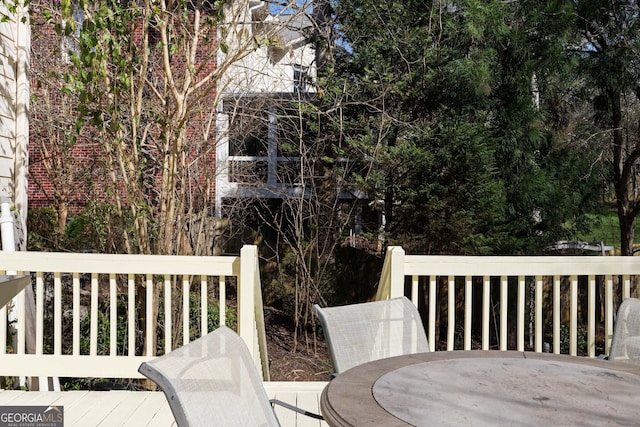 deck featuring outdoor dining space