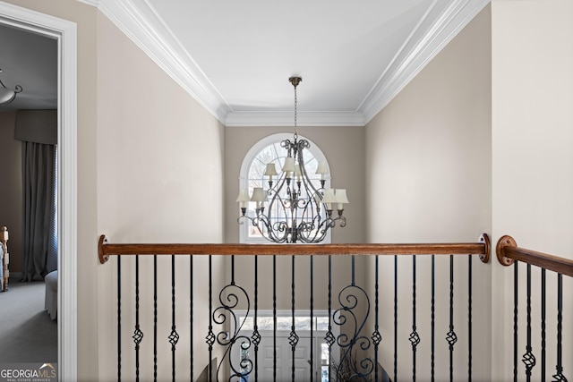 interior details featuring a notable chandelier and ornamental molding