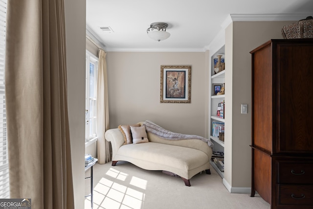 living area featuring crown molding, built in features, visible vents, and light carpet