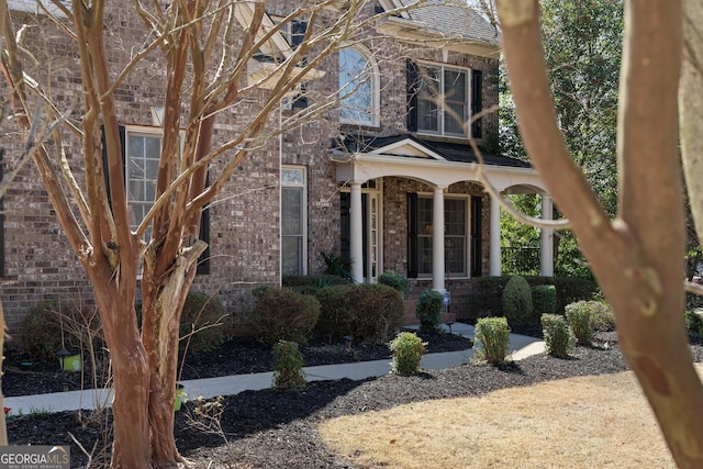 view of front of property with brick siding