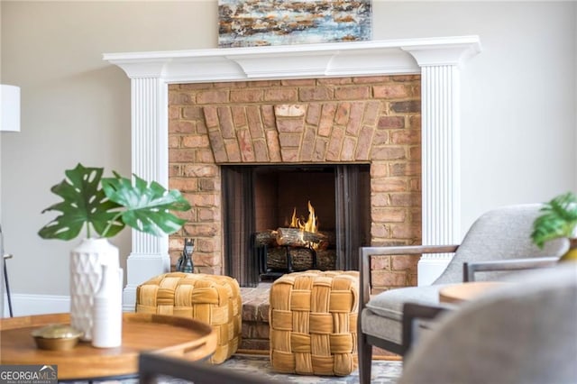 interior details with a brick fireplace