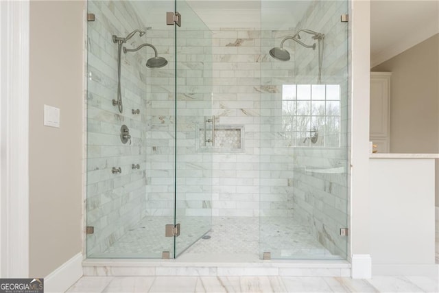 full bathroom with baseboards and a stall shower