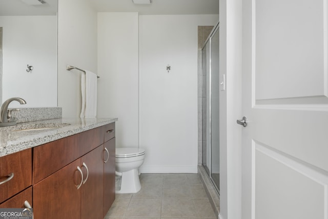 860 Peachtree St Unit 1418, Atlanta, GA 30308 - full bath with vanity, a stall shower, tile patterned floors, and toilet