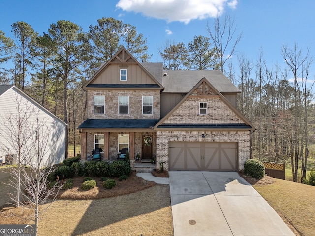 view of front of house featuring brick siding, board and batten siding, a porch, a garage, and driveway