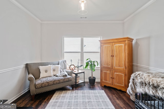 bedroom with visible vents, baseboards, dark wood-style floors, and ornamental molding