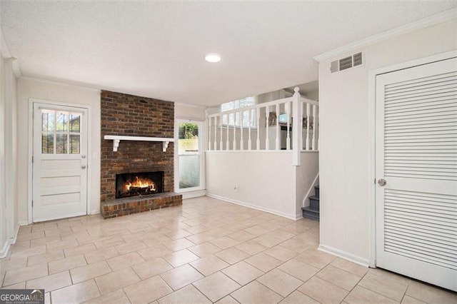 unfurnished living room with visible vents, plenty of natural light, and ornamental molding