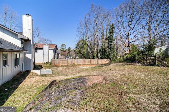 view of yard featuring fence