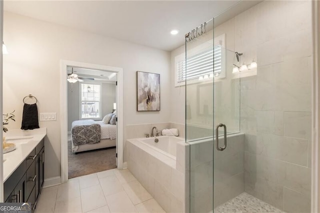 full bathroom with vanity, ensuite bath, a stall shower, tile patterned flooring, and a bath