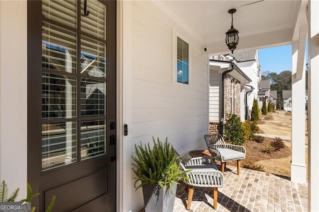 doorway to property featuring a porch