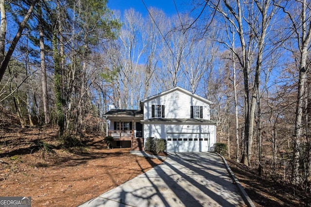 split level home with driveway and a garage