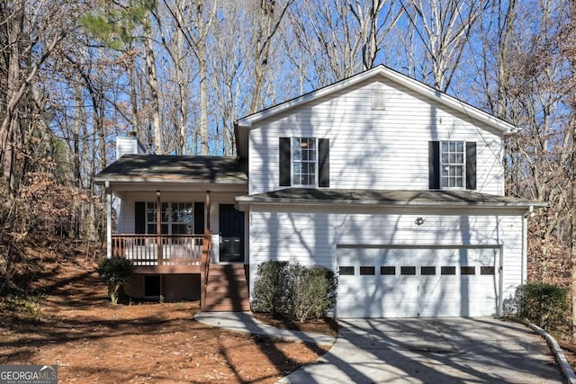 split level home featuring driveway, a chimney, and a garage