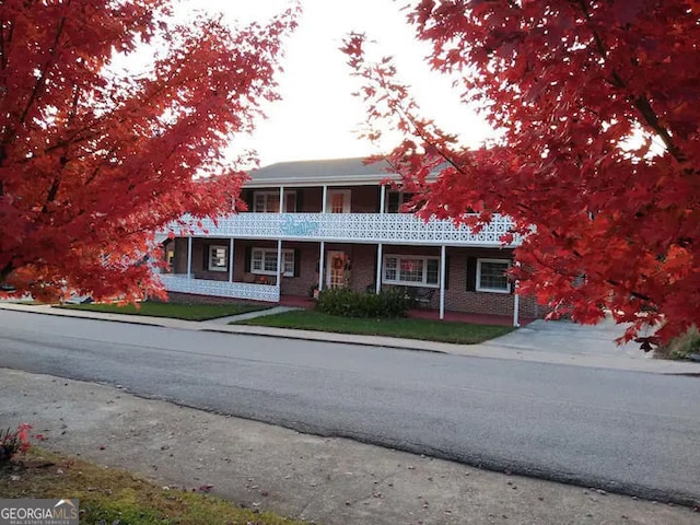 view of front of property with brick siding