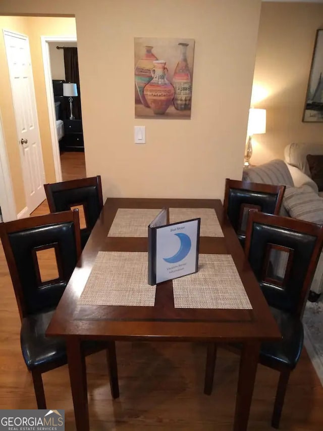 dining room featuring wood finished floors