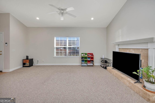 playroom with recessed lighting, carpet flooring, baseboards, ceiling fan, and vaulted ceiling